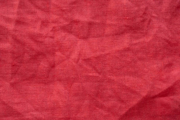 istock Red linen shirt fabric texture background 1160659434
