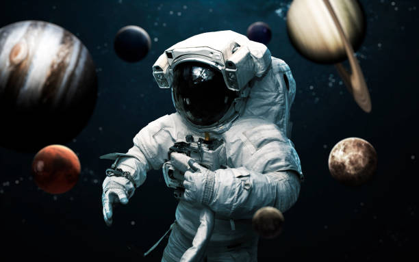 istock Astronaut and all planets of Solar system. Science fiction art. Elements of this image furnished by NASA 1160659478