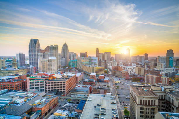 Aerial view of downtown Detroit at sunset in Michigan Aerial view of downtown Detroit at sunset in Michigan, USA detroit michigan stock pictures, royalty-free photos & images