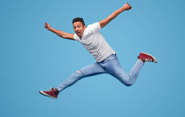 istock Funny black guy leaping in air 1160660810