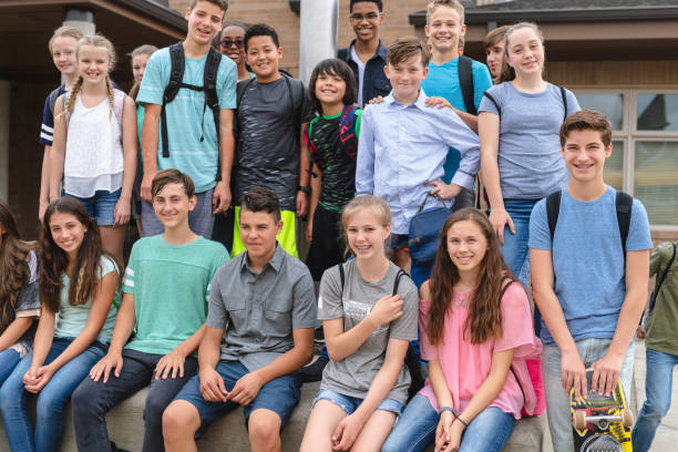 istock Portrait of elementary-age students outside the school 1160662875