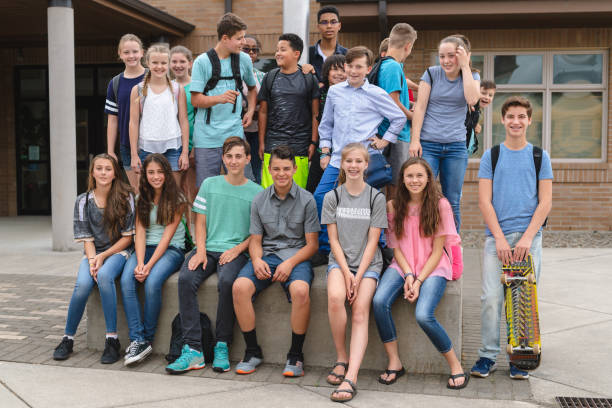 istock Portrait of elementary-age students outside the school 1160662877