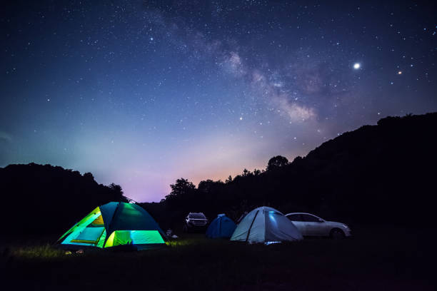 istock Camping in tents under the stars in summer 1160667231