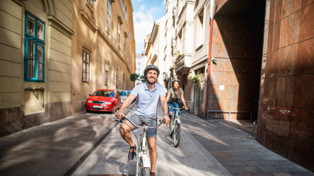 istock Caucasian man exploring Budapest on bicycles with her two friends 1160672681