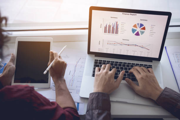 istock Two entrepreneur person working and colleague analyzing data for new start-up business and marketing. 1160674325