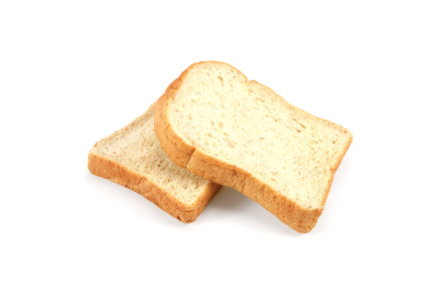 istock Slices of bread on white 1160675738