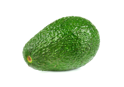 Fresh avocado close up isolated on white background