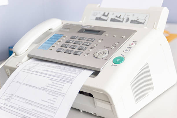 istock The fax machine for Sending documents in the office 1160686008