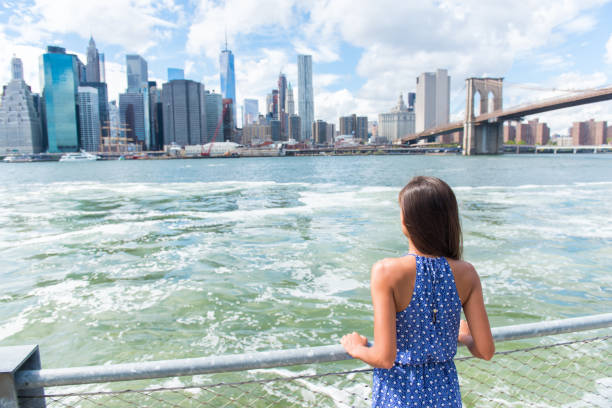 istock New York tourist looking at Manhattan skyline view 1160686817