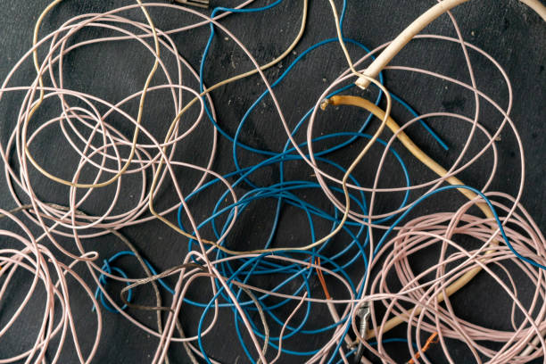 istock bunch of electronic wires or caples in colorful isolation on the table, connection concept 1160687218
