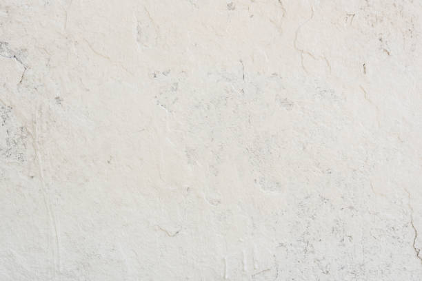 istock Texture of a concrete wall with cracks and scratches which can be used as a background 1160687919
