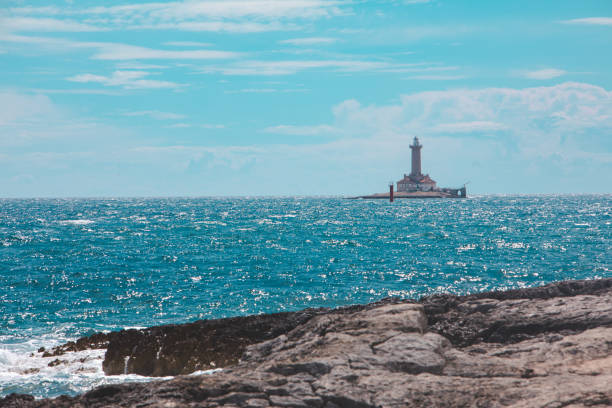 lighthouse it island in sea horizon view seascape copy space