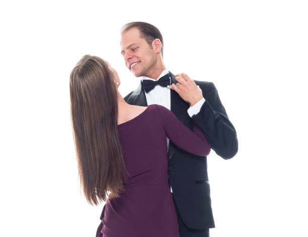 istock Beautiful couple dancing together while wearing formal wear 1160693641