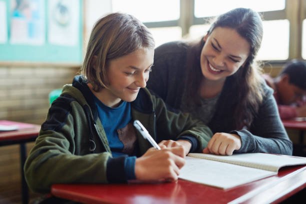 istock As involved as any good teacher should be 1160694112