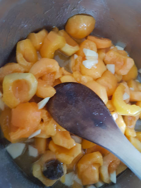 istock jam homemade cooking making apricots and apple slices and sugar 1160694697