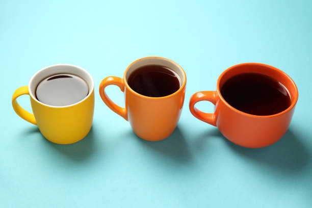 istock Black tea (coffee) in bright cups, office break, team building 1160695756