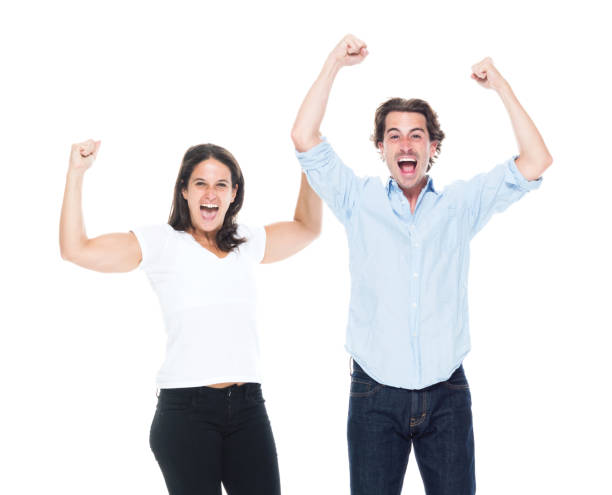istock Attractive couple are cheering 1160695827