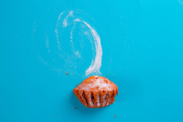 istock muffin on the blue background 1160696566
