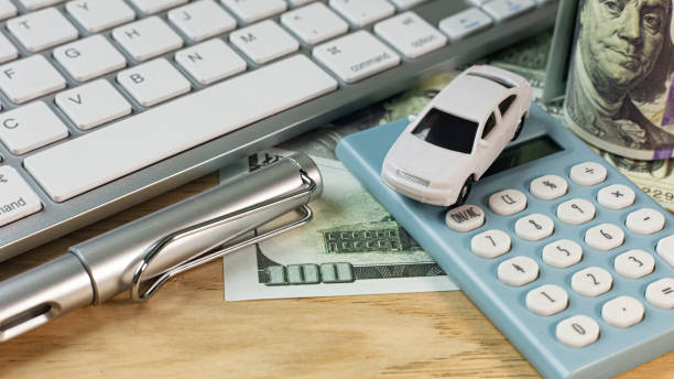 istock white  toy car  on work station table in office. 1160697945