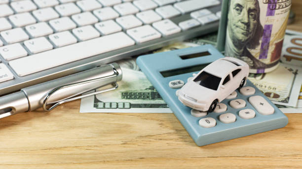 istock white  toy car  on work station table in office. 1160697954