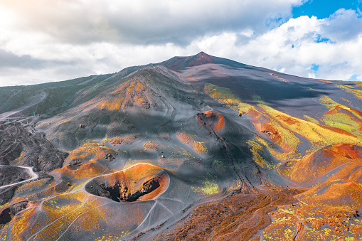 View of the active volcano Etna, extinct craters on the slope, traces of volcanic activity