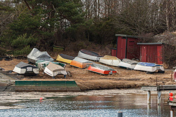 istock Plastic boats laid up for the winter. 1160701560