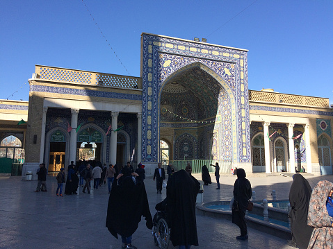 aQom is one of the most important religious cities in Iran, The pilgrims walk in the yard of the shrine, Iran, Qom