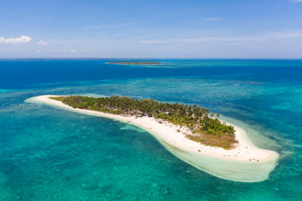 istock Tropical island Canimeran. White sandy beach on a desert island 1160709478
