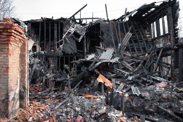 istock The old wooden burned-down house a view from inside 1160713189