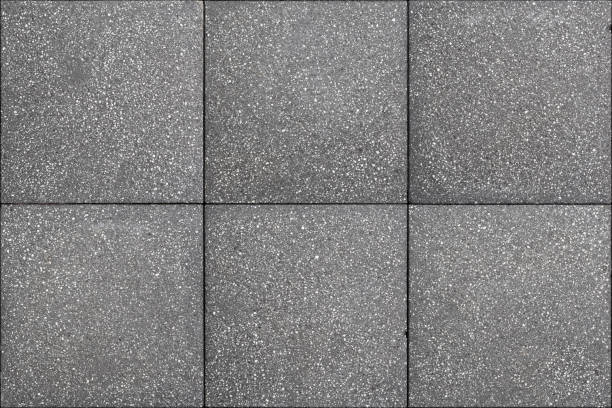 istock Exposed Aggregate or Granite Pavers Seamless (Dark Gray) 1160715772