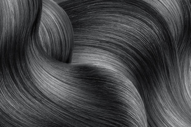 istock Black shiny hair as background 1160725227
