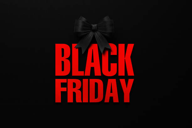 istock Black Bow Tie and Red Black Friday Text on Black Background 1160725480
