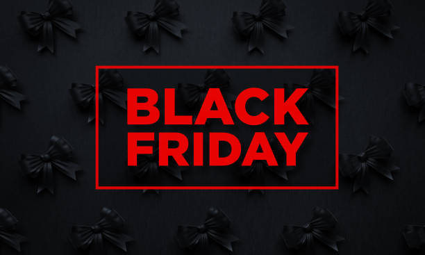 istock Black Bow Tie and Red Black Friday Text on Black Background 1160725907