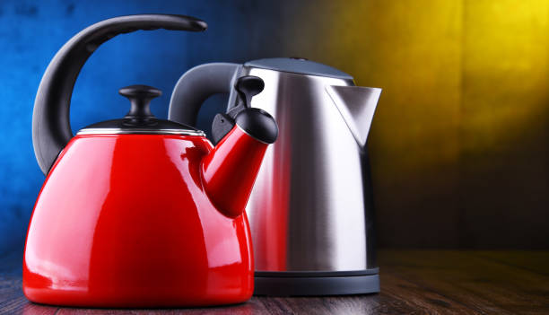 istock stovetop kettle with whistle and electric cordless kettle 1160729169
