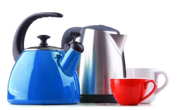 istock stovetop kettle with whistle and electric cordless kettle 1160729173