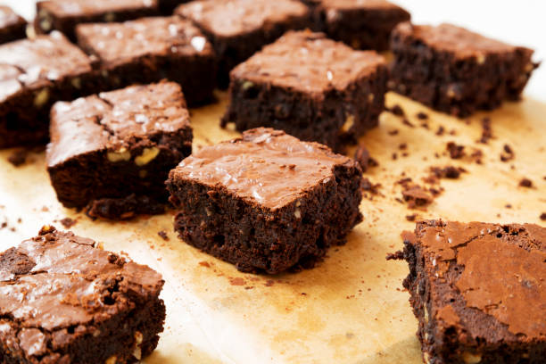 istock Homemade chocolate brownies on a baking sheet, side view. Closeup. 1160729243