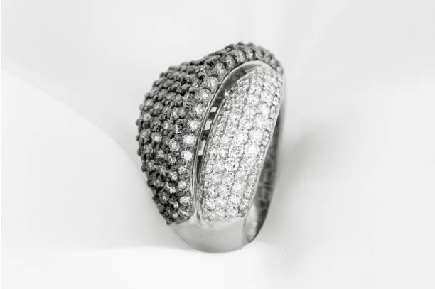 istock White Gold Ring With White And Black Diamonds 1160729507