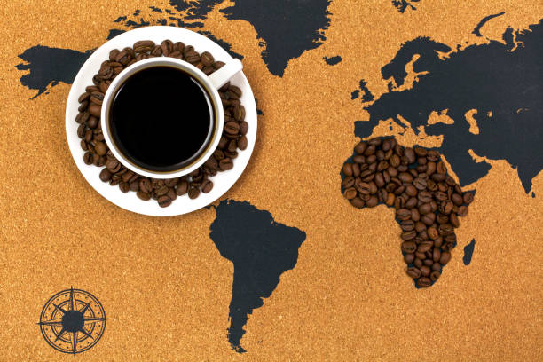 istock Coffee cup on a map with Africa's shape made of coffee beans 1160729536