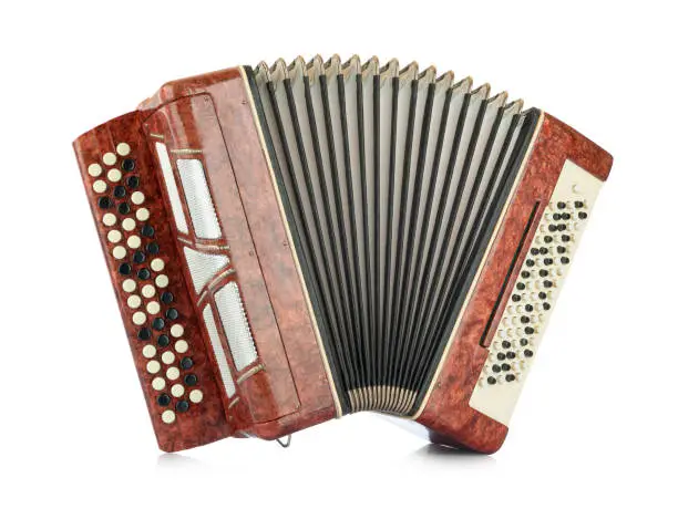 Photo of Brown accordion isolated on white background. File contains a path to isolation