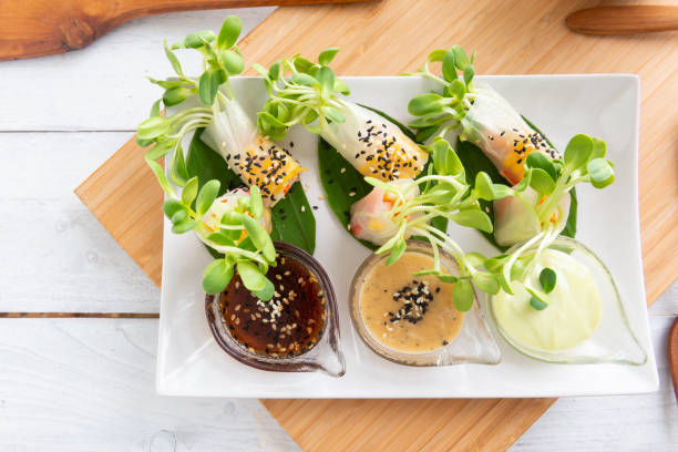 istock Rice paper salad rolls with carrot,sunflower sprout, corn and crab stick 1160733884