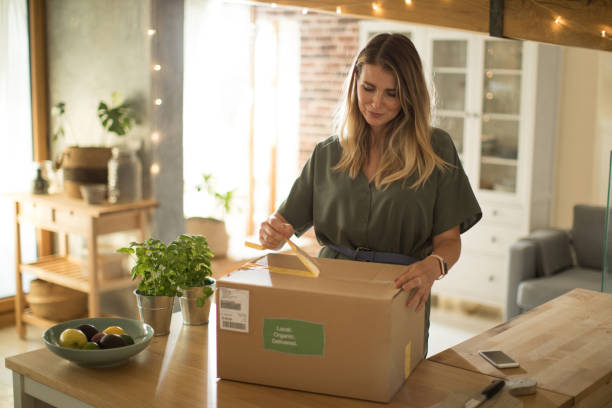 istock Woman got package from meal delivery service. 1160735477