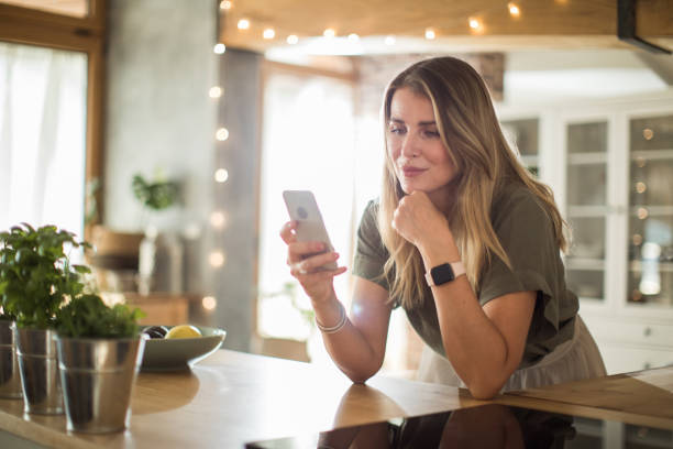 istock Woman using meal delivery service through mobile app. 1160735667