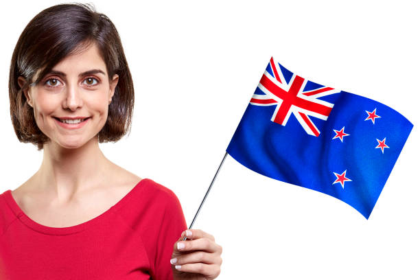 In the bright sunlight, the occasional wink of the sun behind the waving New Zealand flag gives hope. / You can see the animation movie of this image from my iStock video portfolio. Video number: 2230285825