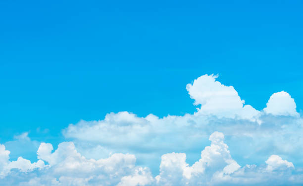 istock Beautiful blue sky and white cumulus clouds abstract background. Cloudscape background.  Blue sky and fluffy white clouds on sunny day. Nature weather. Bright day sky for happy day background. 1160737798