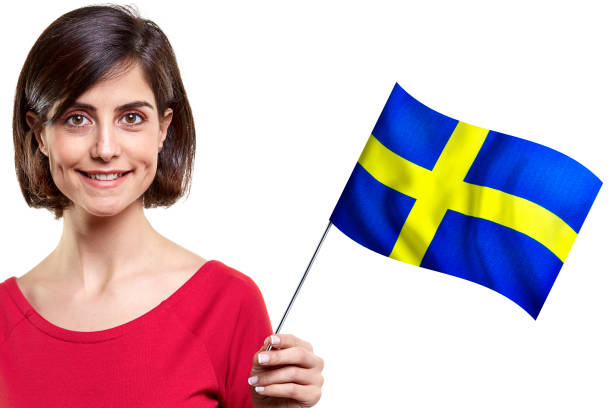 Young Woman Is Holding Swedish Flag On White Background