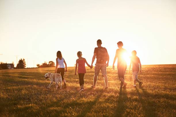 vacations in countryside - people traveling journey group of people hiking imagens e fotografias de stock