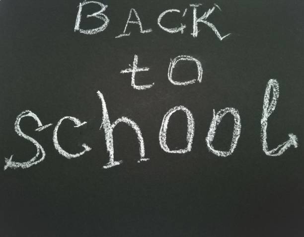 istock Inscription on shcool blackboard Back to school. 1160743154