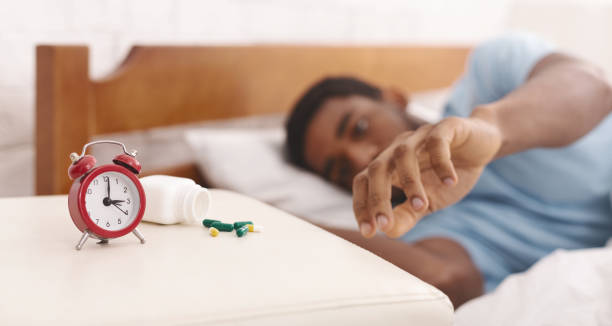 istock African-american man suffering from insomnia in bed 1160746907