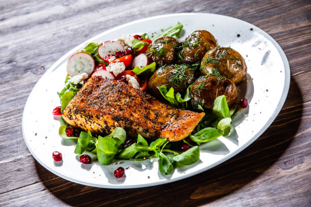istock Roasted salmon and vegetables 1160747495