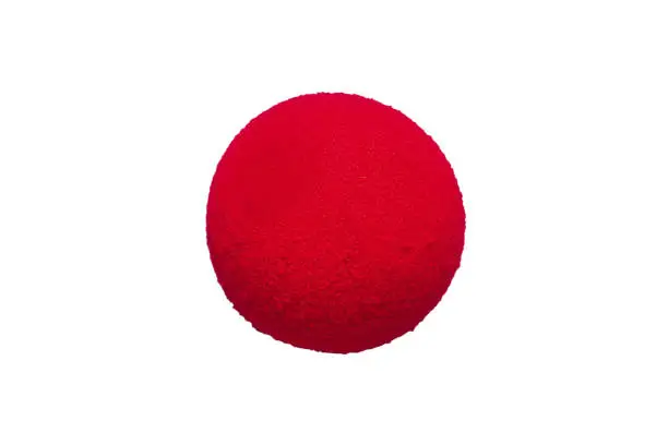 Red foam nose on a white background. Red nose day